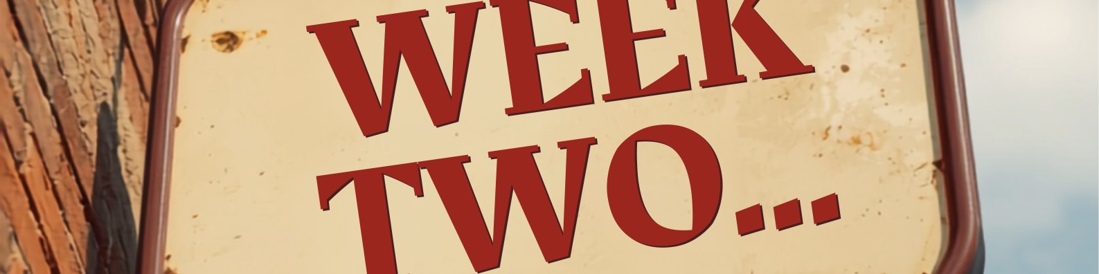 A vintage hanging enamel shop sign reading "Week Two…"
